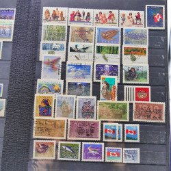 Lot massif de timbres de France oblitérés en 12 albums.