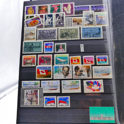 Lot massif de timbres de France oblitérés en 12 albums.