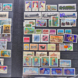 Lot massif de timbres de France oblitérés en 12 albums.