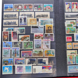 Lot massif de timbres de France oblitérés en 12 albums.