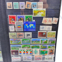 Lot massif de timbres de France oblitérés en 12 albums.