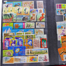 Lot massif de timbres de France oblitérés en 12 albums.