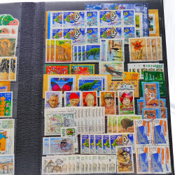 Lot massif de timbres de France oblitérés en 12 albums.
