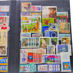 Lot massif de timbres de France oblitérés en 12 albums.