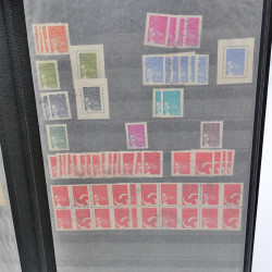 Lot massif de timbres de France oblitérés en 12 albums.