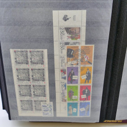 Lot massif de timbres de France oblitérés en 12 albums.