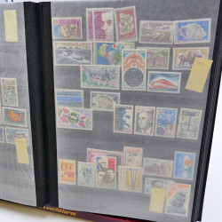 Lot massif de timbres de France oblitérés en 12 albums.