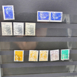 Lot massif de timbres de France oblitérés en 12 albums.