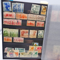 Lot massif de timbres de France oblitérés en 12 albums.