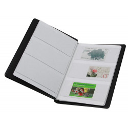 Classeur de poche pour timbres avec 6 feuilles fond blanc.