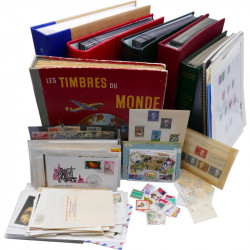 Vrac de timbres France et Monde neufs et oblitérés en un carton.