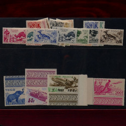 Vrac de timbres France et Monde neufs et oblitérés en un carton.