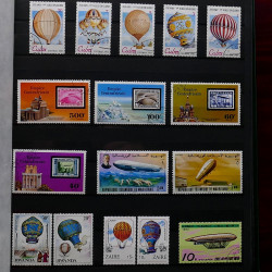 Vrac de timbres France et Monde neufs et oblitérés en un carton.