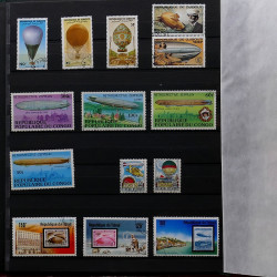 Vrac de timbres France et Monde neufs et oblitérés en un carton.