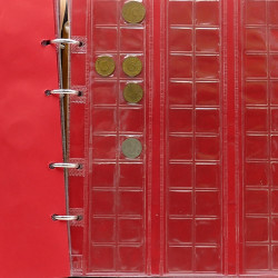 Lot de billets et monnaies du monde en 2 albums.