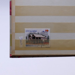 Lot de timbres France et Monde à trier en un carton.