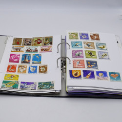 Lot massif de timbres France et Monde à trier en un carton.