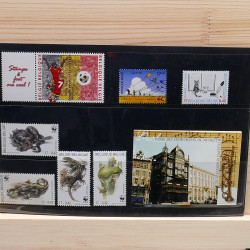 Lot de timbres France et Monde à trier en un carton.