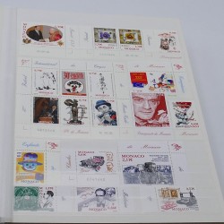 Lot de timbres de Monaco et DOM-TOM neufs** en un album.