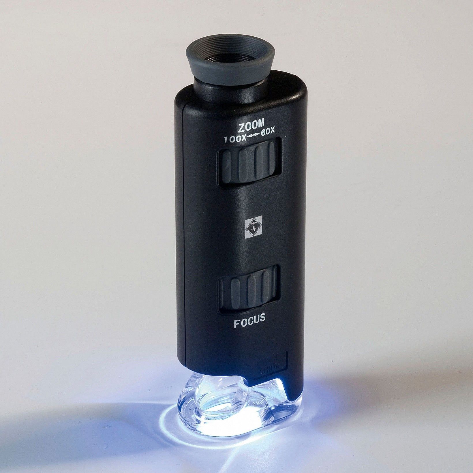 Faire un zoom sur mini-Microscope de poche LED avec lampe UV